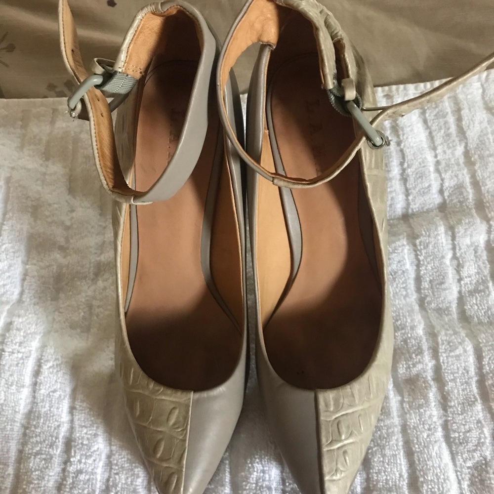 L.A.M.B. Ankle strap lamb skin heels.